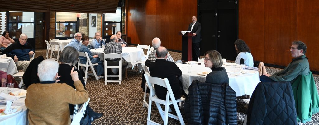 Audience attending Howard Hook retirement planning lecture at Temple Emeth